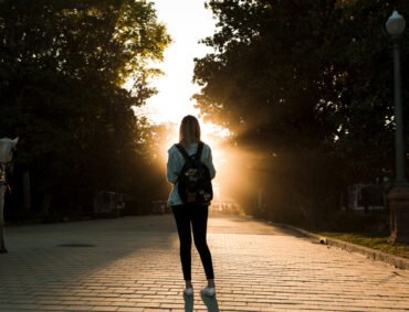 faceless-woman-park-sunset