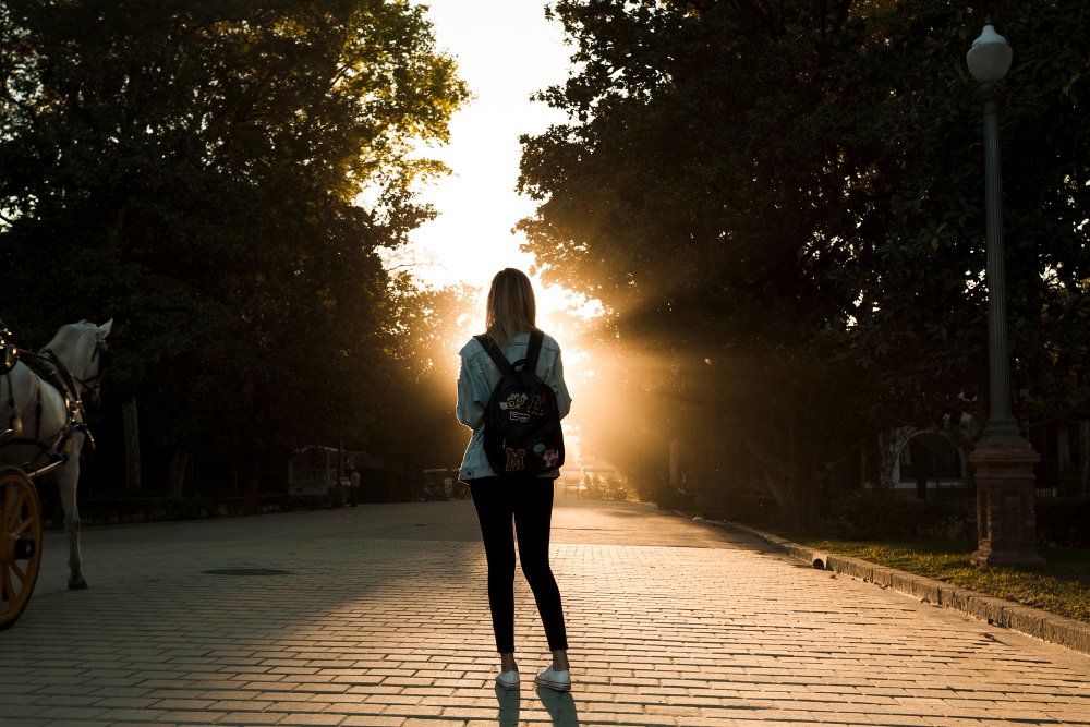 faceless-woman-park-sunset